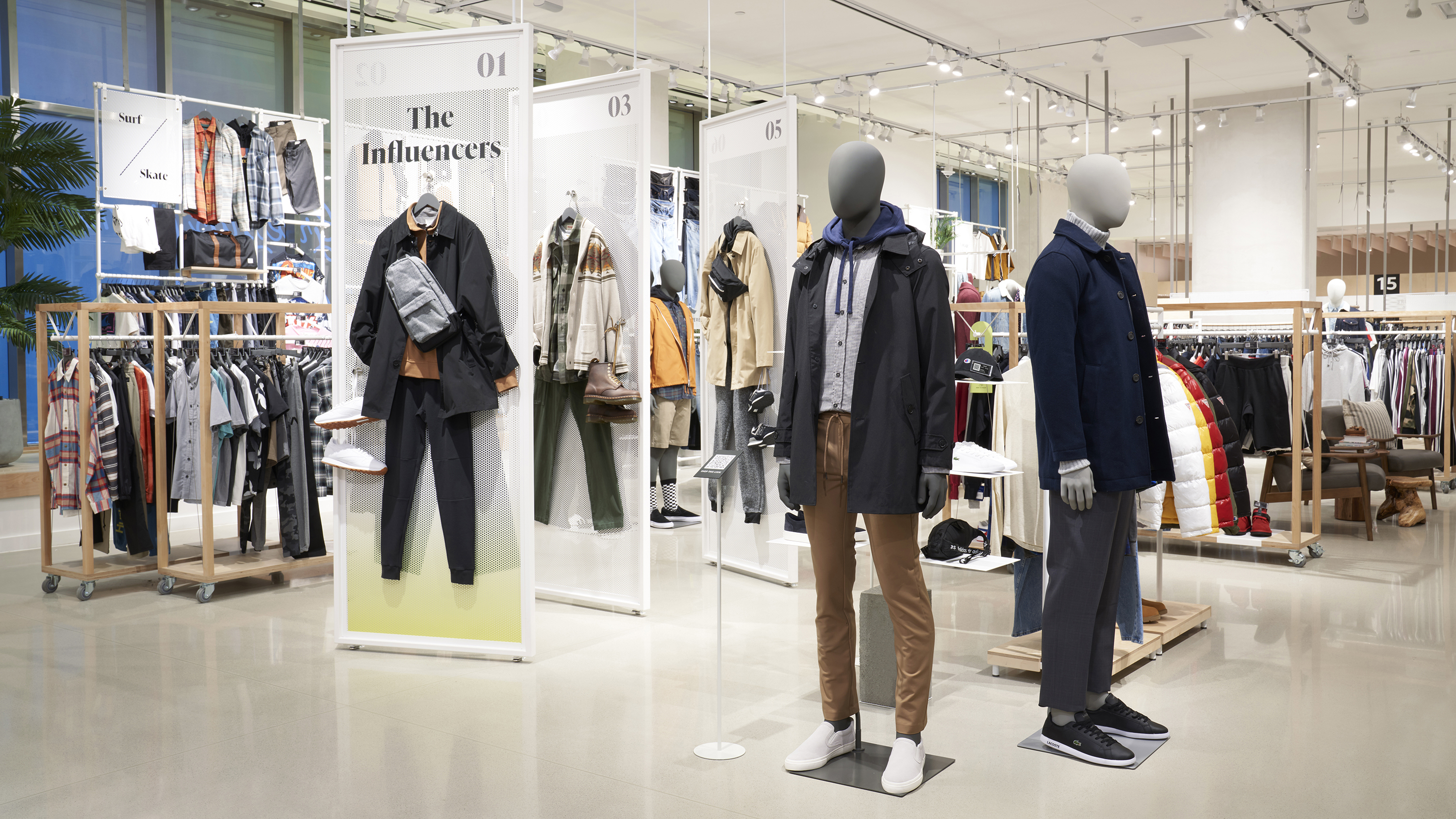 This image provided by Amazon, shows how clothing could be displayed at the company's new Amazon Style store concept. Amazon is set to open its first-ever physical clothing store later this year at the Americana at Brand mall in Glendale, Calif., that will push out personalized recommendations as customers shop and scan items on their phone and feature high-tech dressing rooms, the company announced Thursday, Jan. 20, 2021. (Greg Montijo/Amazon via AP)