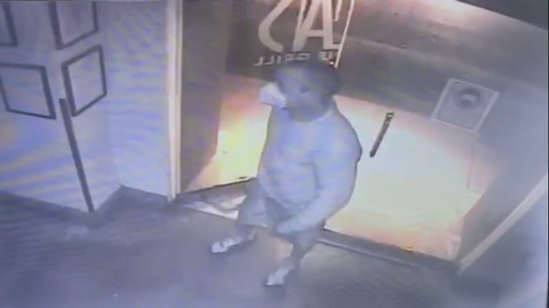 An image taken from surveillance video shows a suspect breaking into LALA's on Melrose.