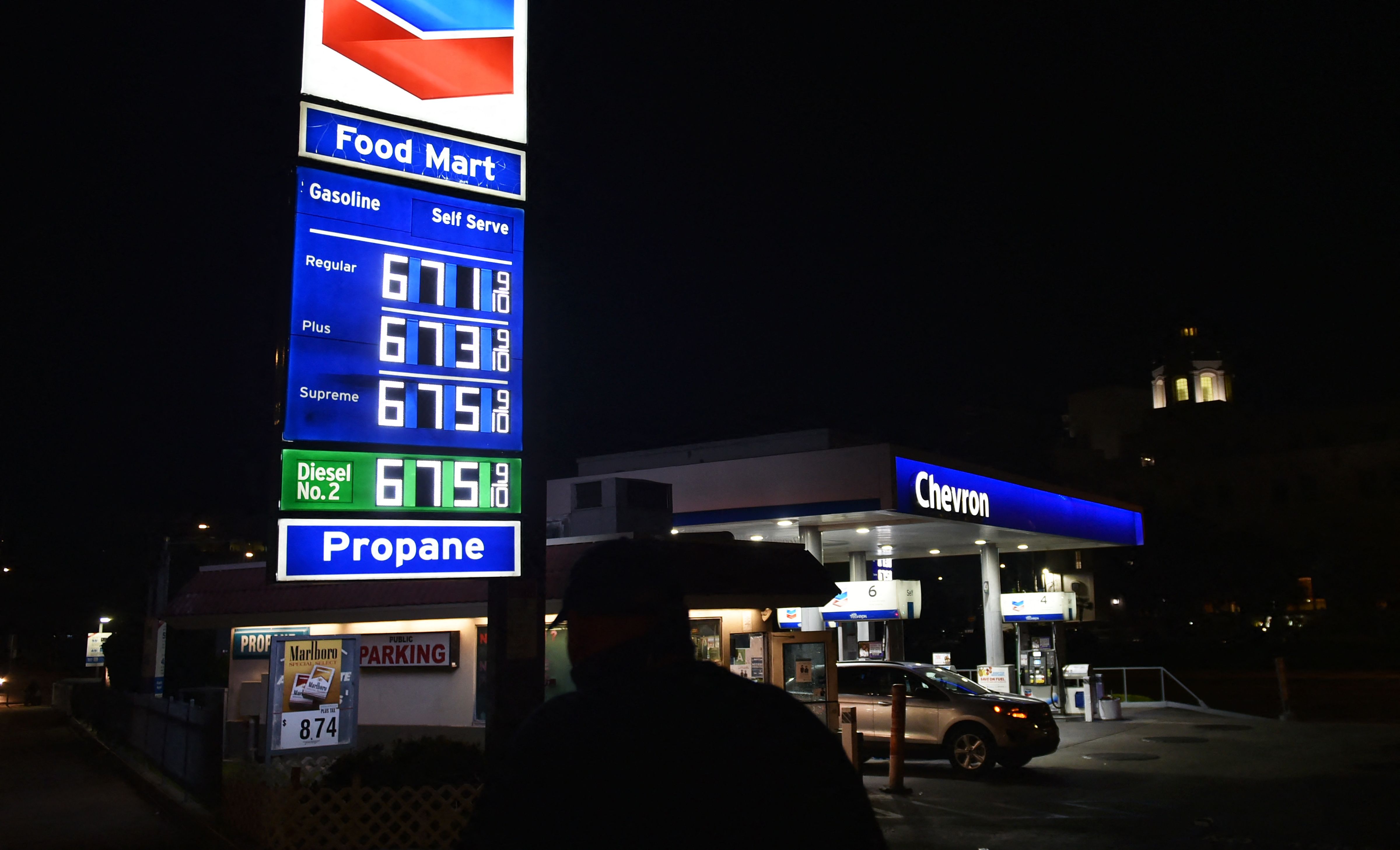 The prices for gas and diesel fuel, over $6.00 a gallon, are displayed at a petrol station in Los Angeles, March 2, 2022. - Oil prices soared March 2 above $113 per barrel and natural gas hit a record peak, as investors fretted over key producer Russia's intensifying assault on Ukraine. (Frederic J. BROWN / AFP) (Photo by