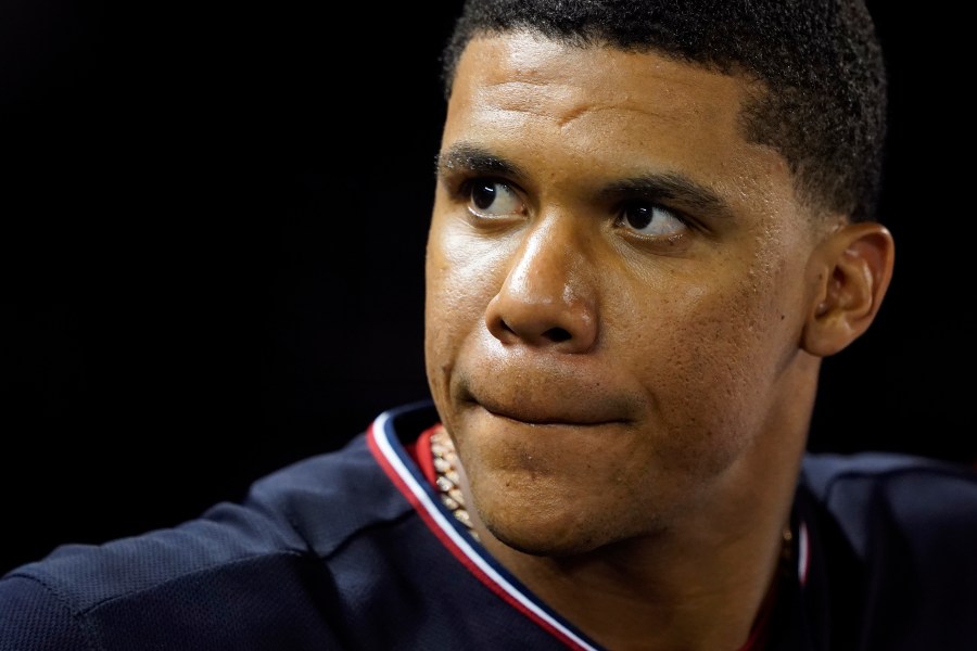 Washington Nationals' Juan Soto stands in the dugout in the seventh inning of a baseball game against the St. Louis Cardinals on July 29, 2022 in Washington. (Patrick Semansky/Associated Press)