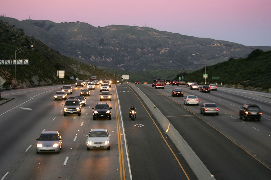 A motorcyclist drives in the High Occupancy Vehicle lane, on the 118 Freeway on Feb. 3, 2005 near Simi Valley. (David McNew/Getty Images)