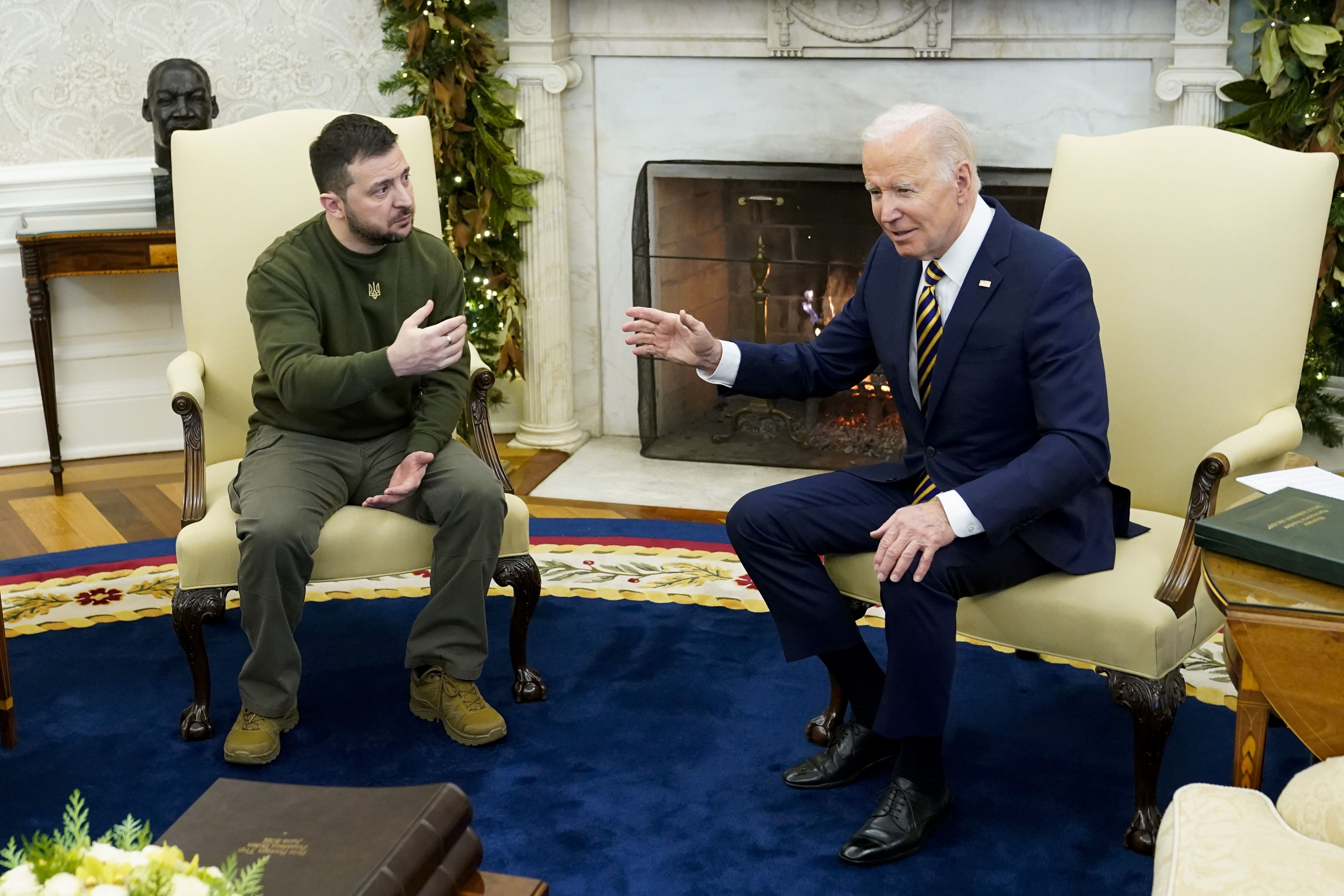 President Joe Biden speaks with Ukrainian President Volodymyr Zelenskyy as they meet in the Oval Office of the White House on Dec. 21, 2022. (Patrick Semansky/Associated Press)