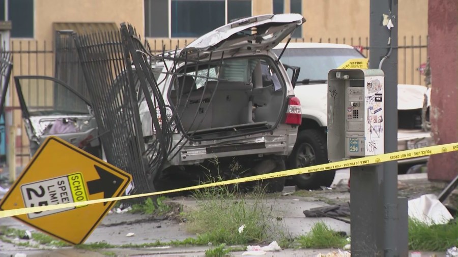 An SUV sustains heavy damage after a high-speed crash that left four injured in South L.A. on Jan. 9, 2023.
