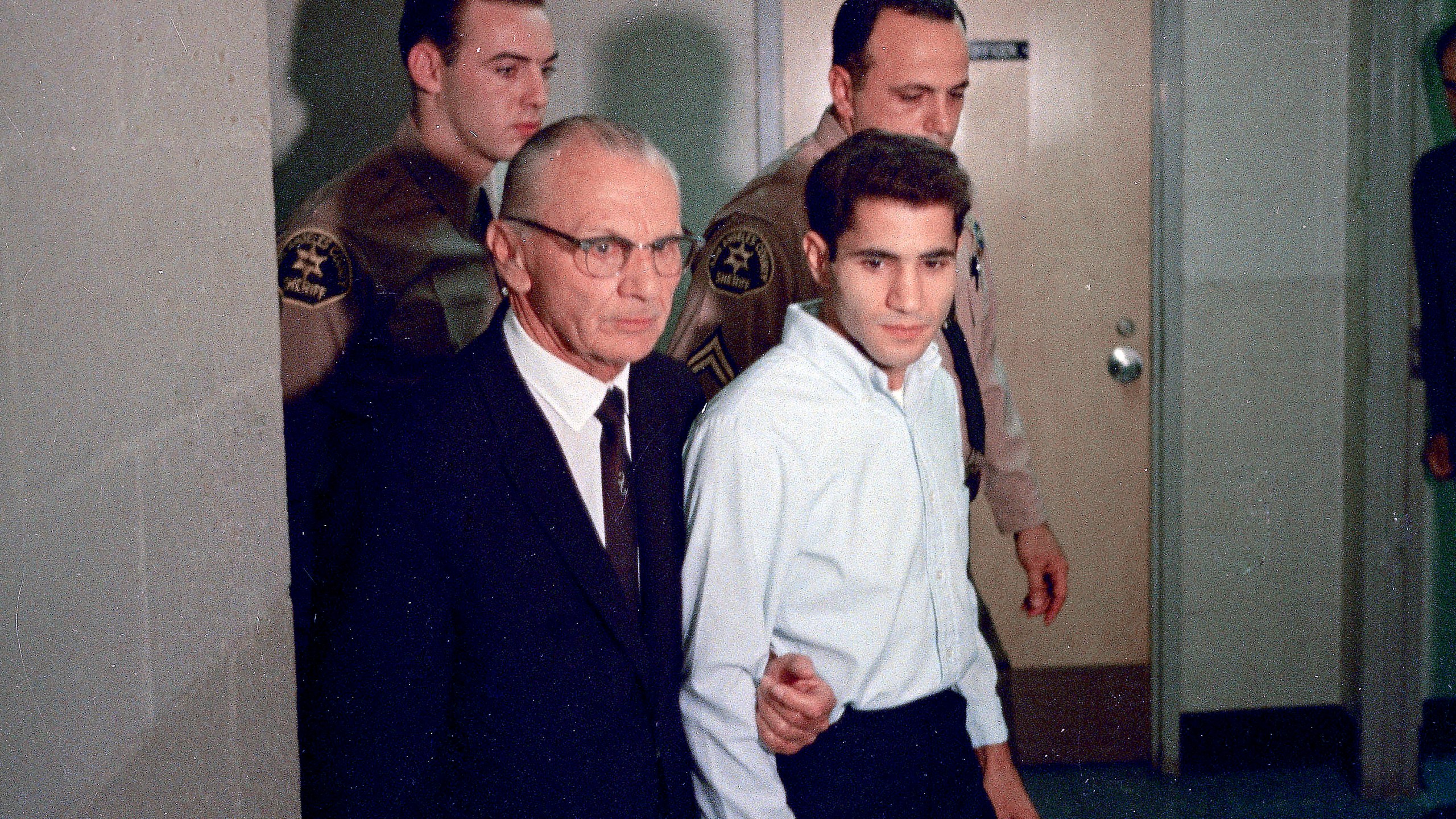 This June 1968 photo shows Sirhan Sirhan, right, accused assassin of Sen. Robert F. Kennedy, with his attorney Russell E. Parsons in Los Angeles. (Associated Press)