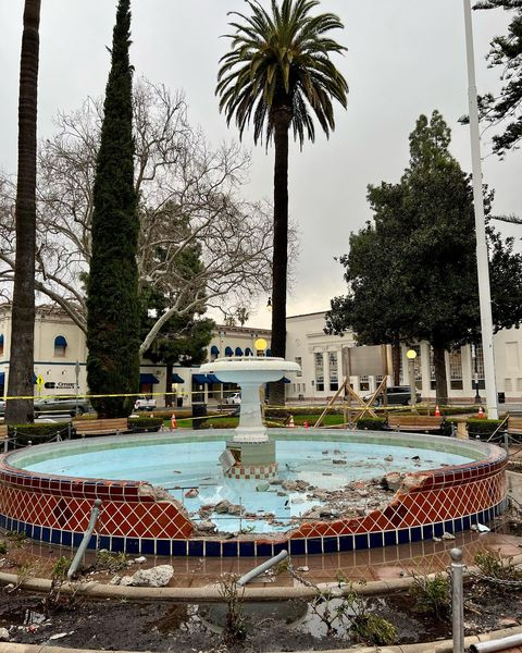Damage seen to the historic Plaza Park fountain after a suspect, fleeing police, collided with it on March 13, 2023. (Orange PD)