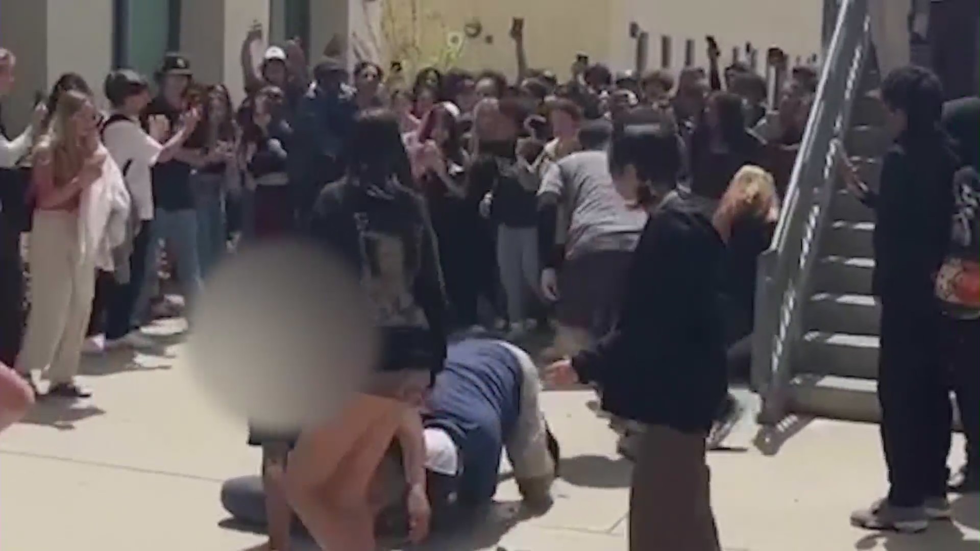 Video of a fight breaking out during lunchtime at Martin Luther King High School in Riverside on April 24, 2023. (KTLA)