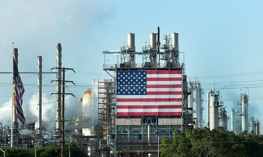 The US flag is displayed at the Wilmington Oil Fields south of Los Angeles, California on April 21, 2020. (Getty Images)