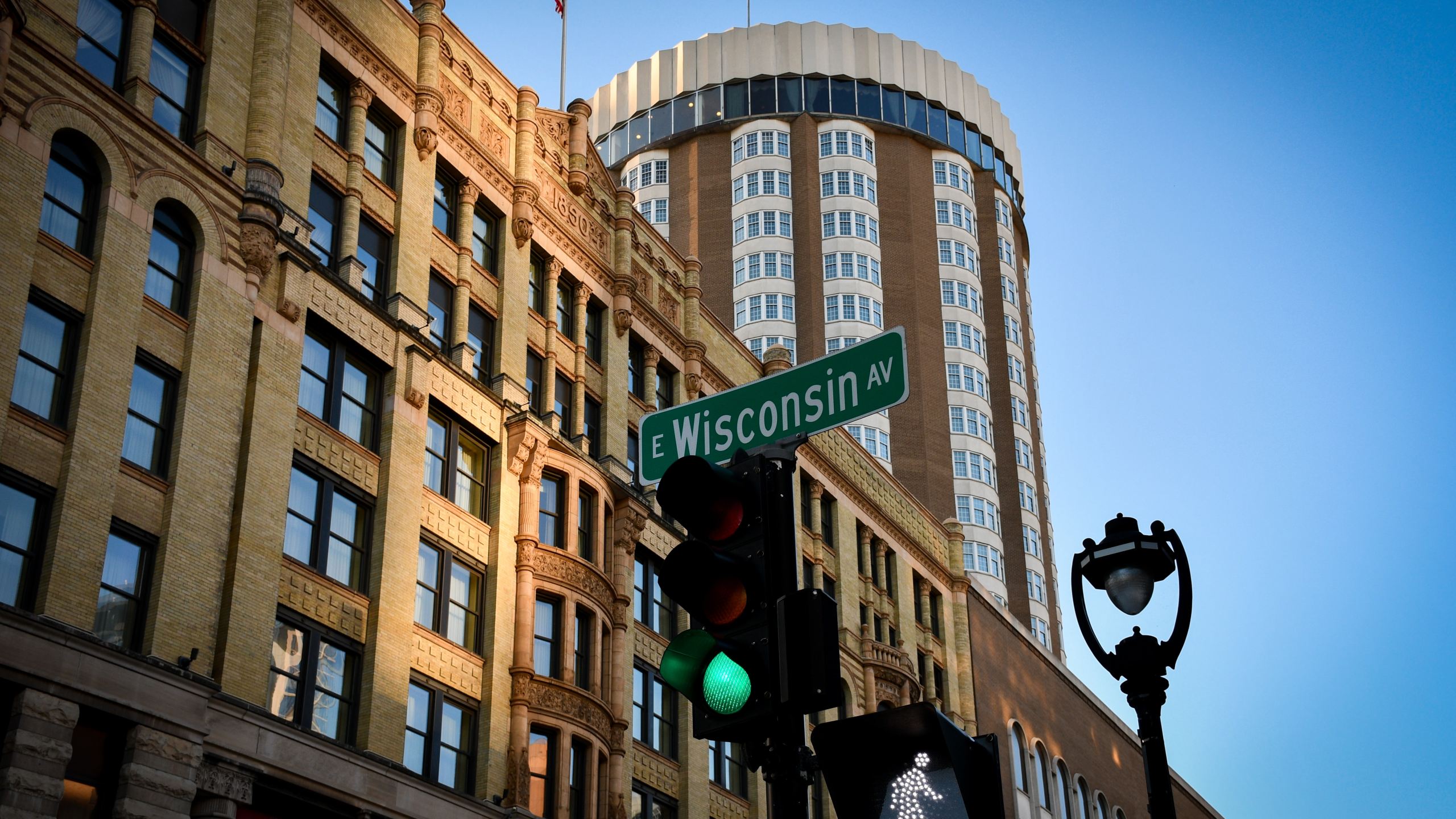 View of the Pfister Hotel from an East Wisconsin Avenue crosswalk in November 2022 (Casey Lovegrove/Unsplash)