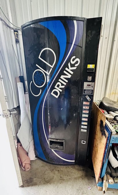 A vending machine where a police dog found a massive haul of illegal narcotics and an assault rifle. (Los Angeles Police Department)
