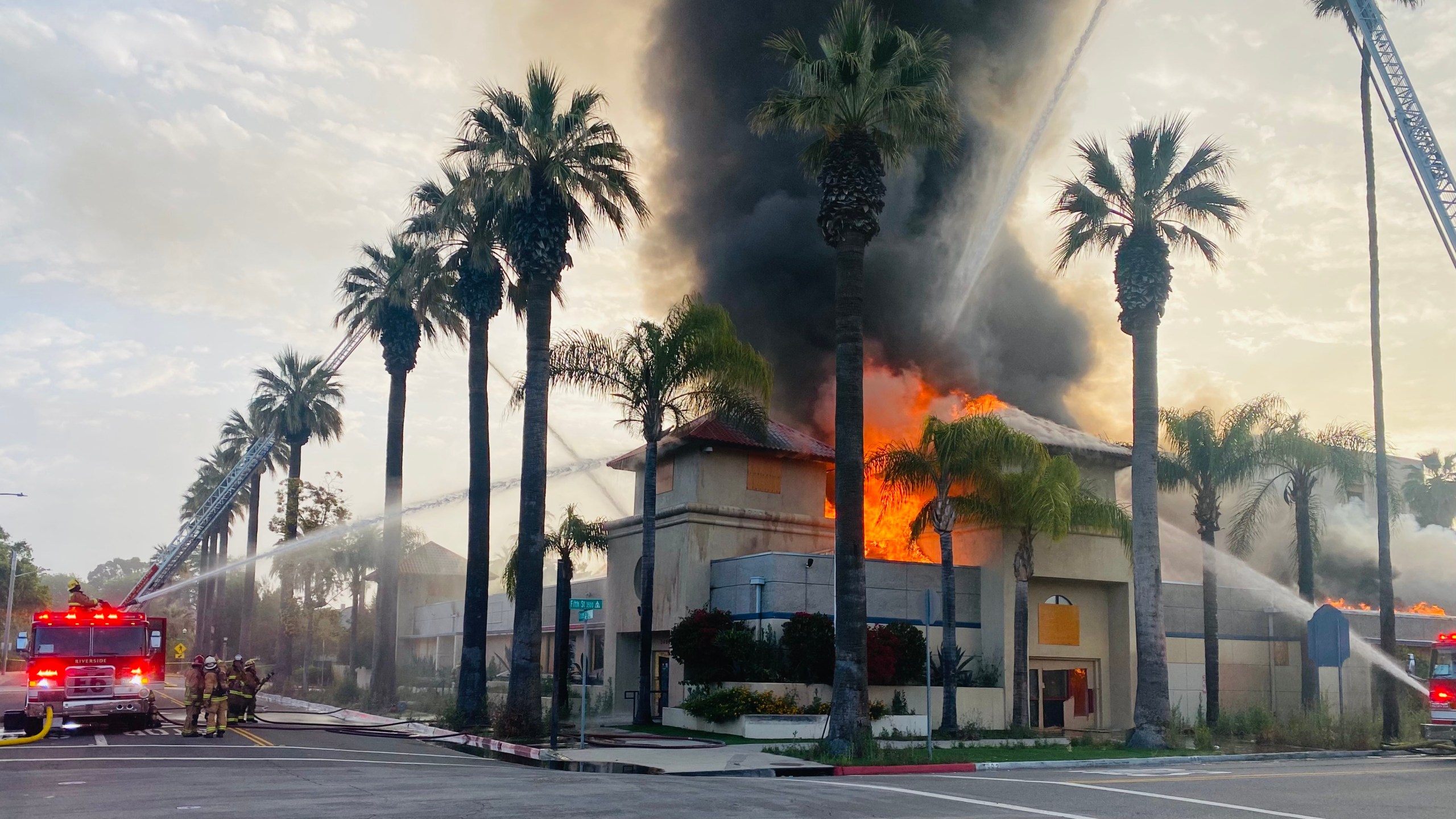 Two men were arrested for allegedly setting fire to a city-owned building in Riverside, causing millions of dollars in damages. (Riverside Fire Department)