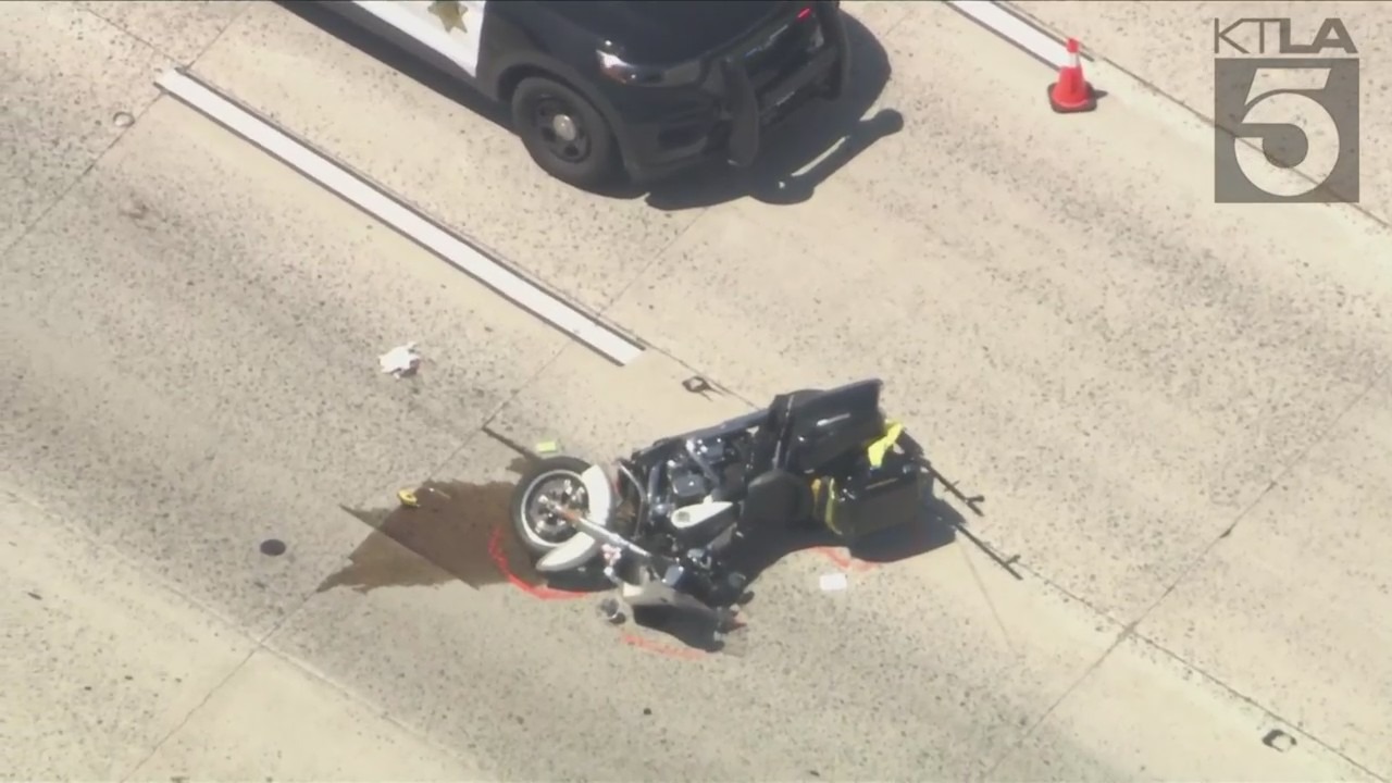 A California Highway Patrol motorcycle is seen down on the 15 Freeway on June 27, 2023. (KTLA)