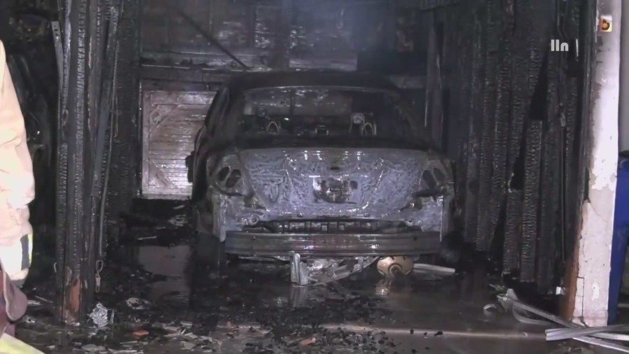 Multiple families were forced to evacuate their homes after an intense fire ripped through a parking garage and destroyed two vehicles in the Fairfax District of Los Angeles, California on June 10, 2023. (LLN)