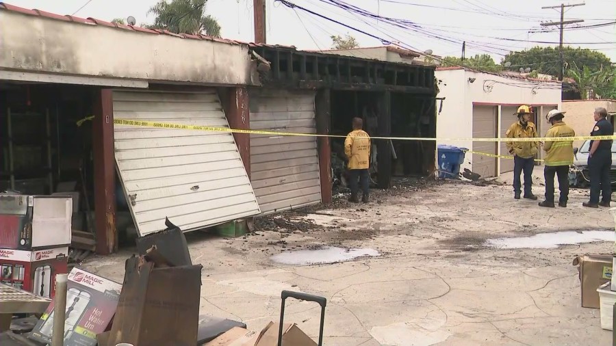 Multiple families were forced to evacuate their homes after an intense fire ripped through a parking garage and destroyed two vehicles in the Fairfax District of Los Angeles, California on June 10, 2023. (KTLA)