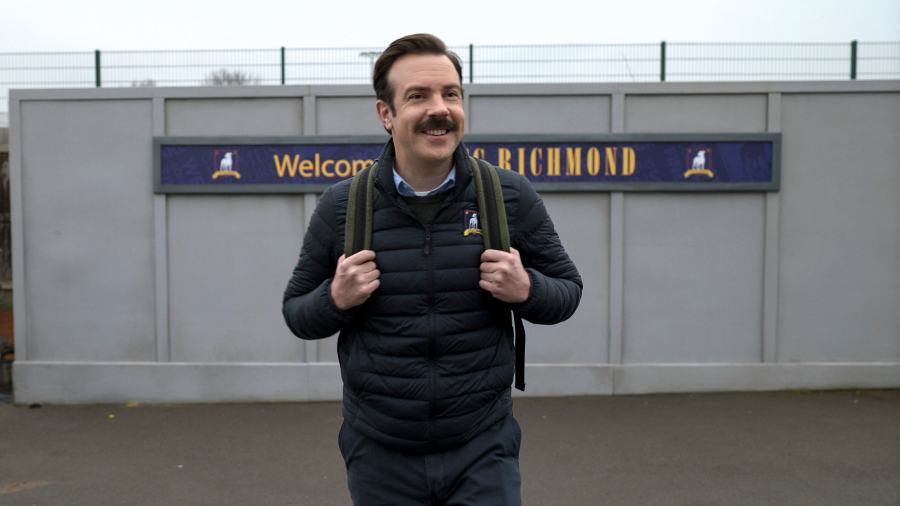 This image released by Apple TV+ shows Jason Sudeikis in a scene from "Ted Lasso." (Colin Hutton/Apple TV+ via AP)