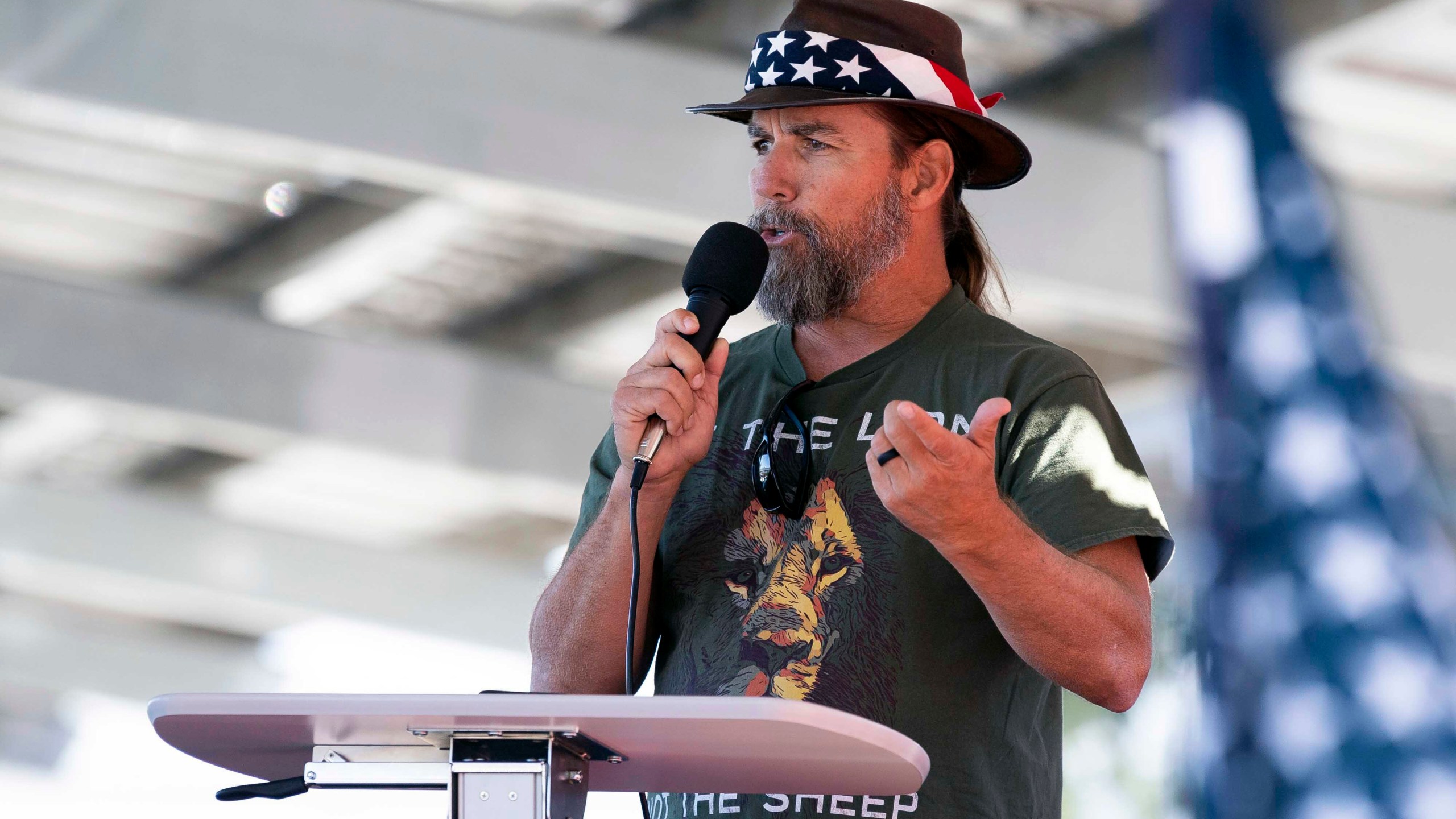 FILE - Alan Hostetter speaks during a pro-Trump election integrity rally he organized at the Orange County Registrar of Voters offices in Santa Ana, Calif., Nov. 9, 2020. A former California police chief was convicted on Thursday, July 13, 2023, of joining the riot at the U.S. Capitol with a hatchet in his backpack and plotting to stop Congress from certifying President Joe Biden's 2020 electoral victory. A judge in Washington's federal court heard testimony without a jury before convicting Hostetter, a right-wing activist and vocal critic of COVID-19 restrictions who defended himself at his bench trial with help from a standby attorney. (Paul Bersebach/The Orange County Register via AP, File)