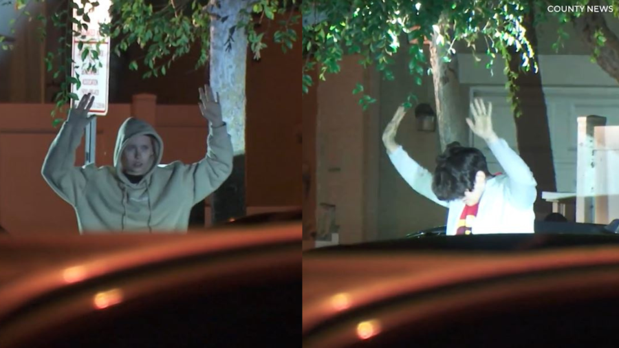 SWAT Team arrested two suspects at their Irvine home after a teenager was shot and killed in an Irvine neighborhood on Aug. 3, 2023. (County News.TV)