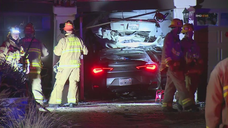 Car crashes into home
