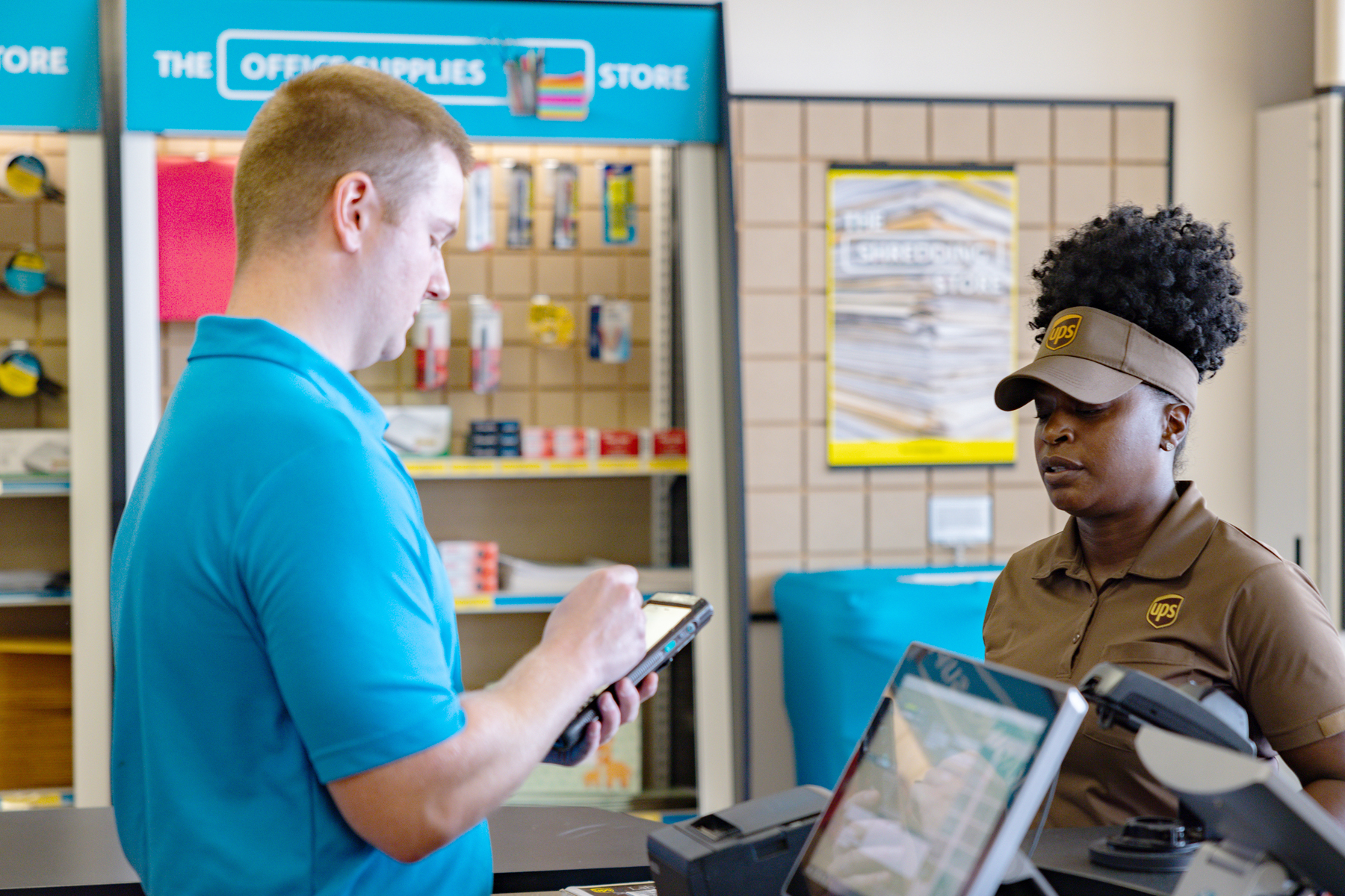 UPS workers at a store. (United Parcel Service)