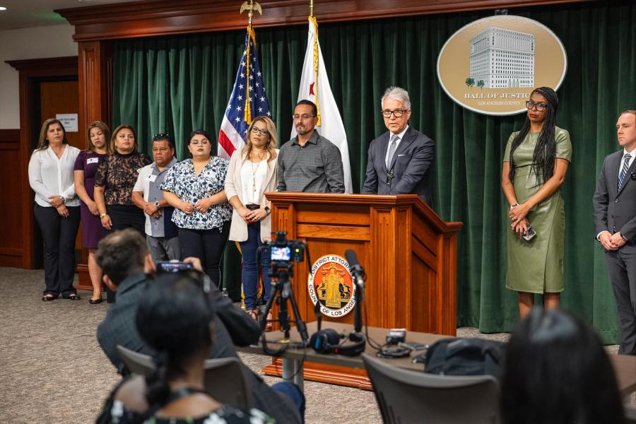 Gerardo Cabanillas stands with loved ones and supporters alongside Los Angeles County District Attorney George Gascón at a press conference in which the DA announced his release from prison and vacation of his conviction from 1996. (Los Angeles County District Attorney's Offce)