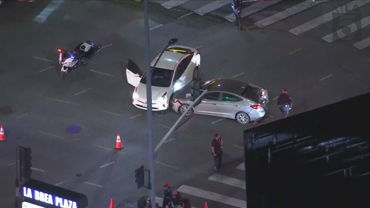 At least one person is hospitalized after a three-vehicle collision sent a truck crashing through a pizza shop in Hollywood on Oct. 31, 2023. (KTLA)