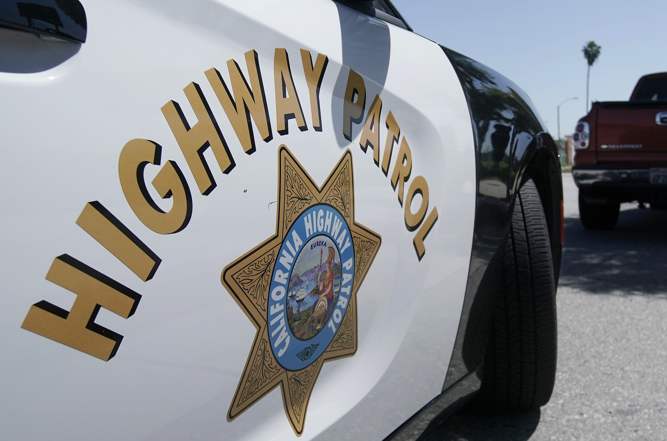 FILE - A California Highway Patrol officer stops a motorist in Anaheim, Calif., April 23, 2020. State authorities were investigating Monday, Nov. 20, 2023, after a California Highway Patrol officer shot and killed a man on a Los Angeles area freeway during a struggle over the weekend that was recorded on video. (AP Photo/Chris Carlson, File)