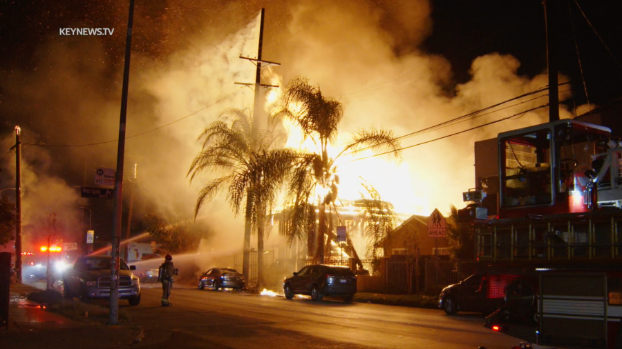 A fire burning in the Central-Alameda neighborhood is seen on Nov. 28, 2023.
