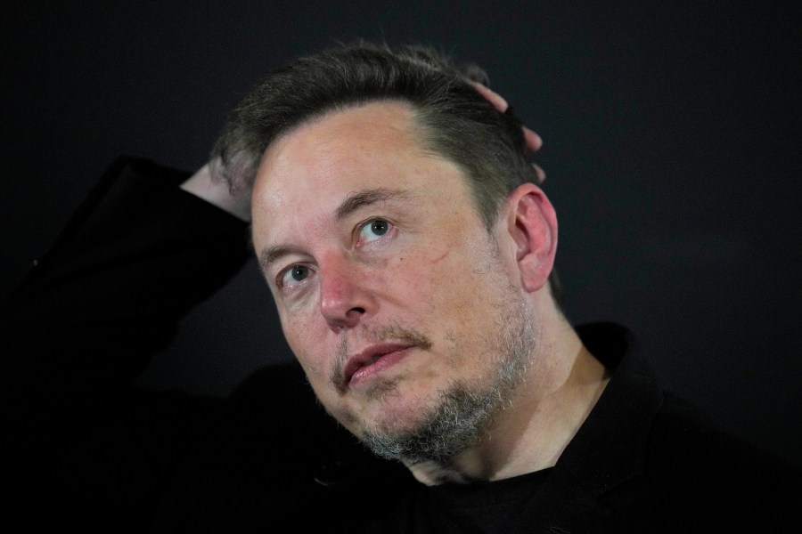 Elon Musk reacts during an in-conversation event with Britain's Prime Minister Rishi Sunak in London, on Nov. 2, 2023.