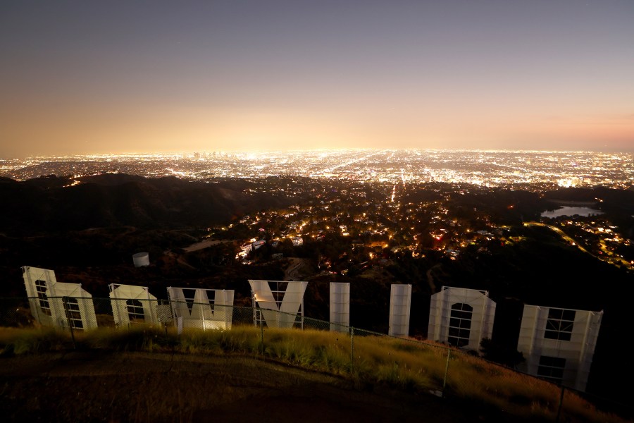 The Hollywood sign stands at dusk on day 106 of the SAG-AFTRA strike against the Hollywood studios on October 27, 2023 in Los Angeles, California.