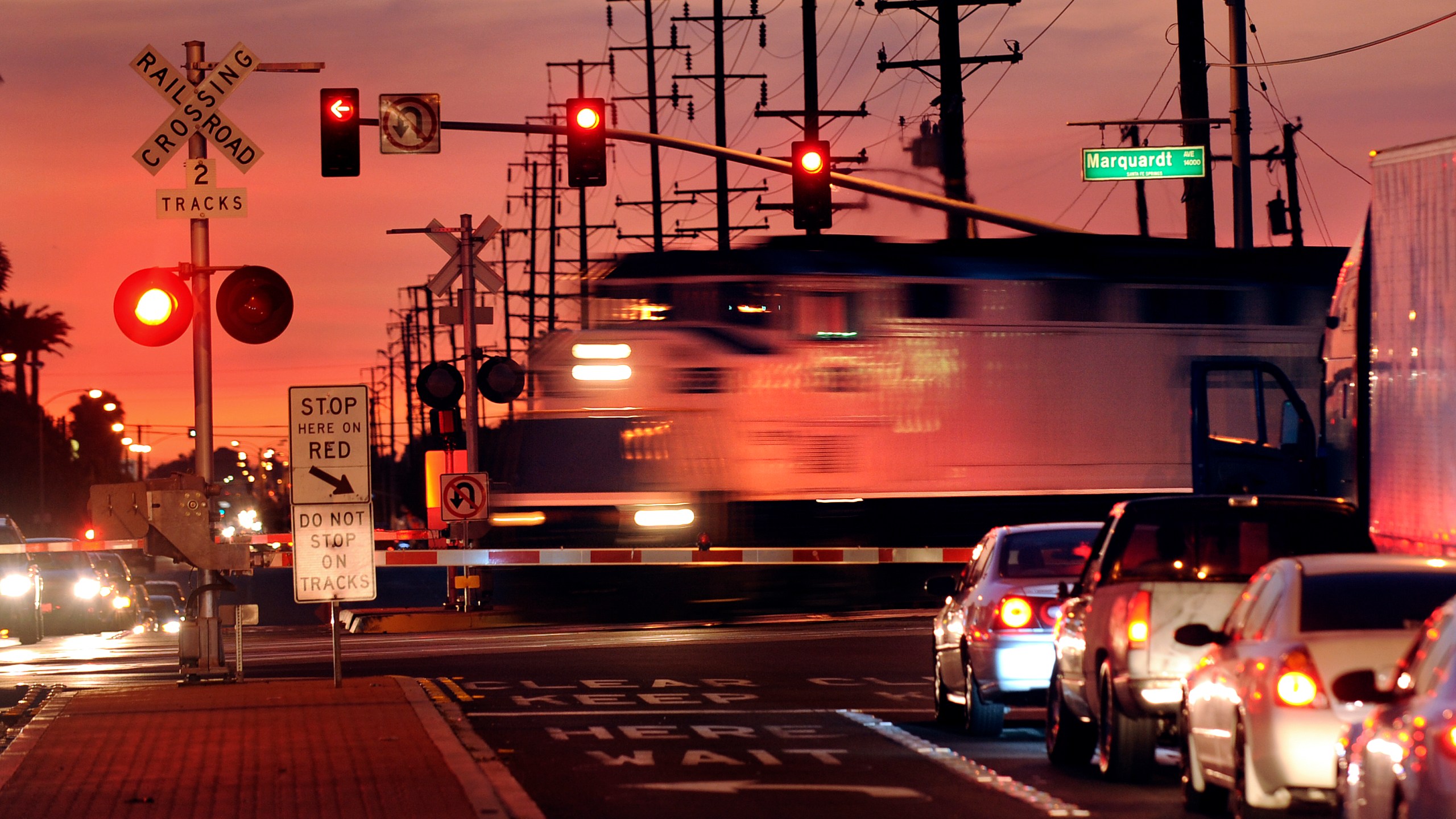 A Metrolink train crosses the intersection of Rosecrans Ave. and Marquardt Ave. in Santa Fe Springs. (Getty Images)