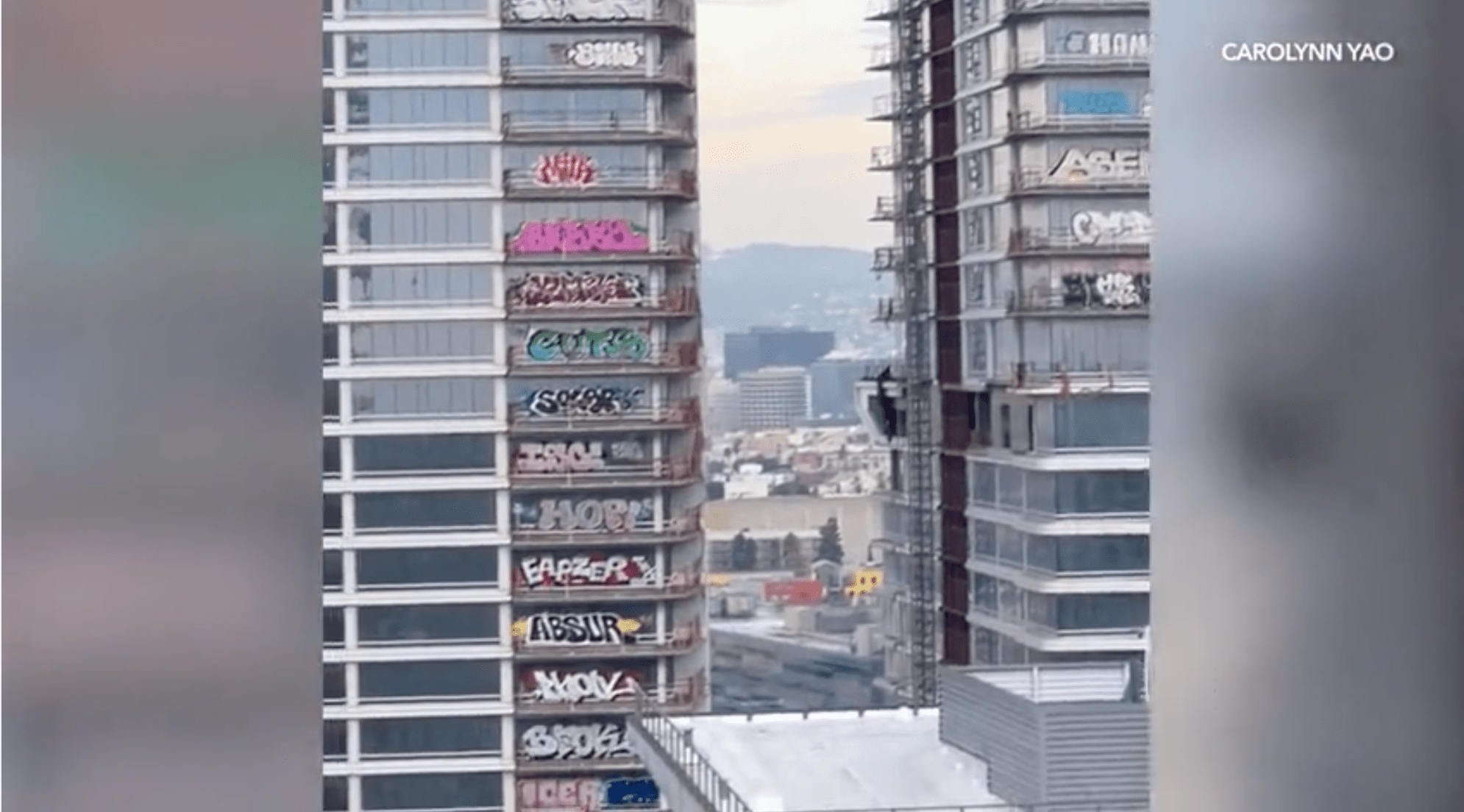 Tagger graffitis 27 stories of skyscraper in downtown Los Angeles