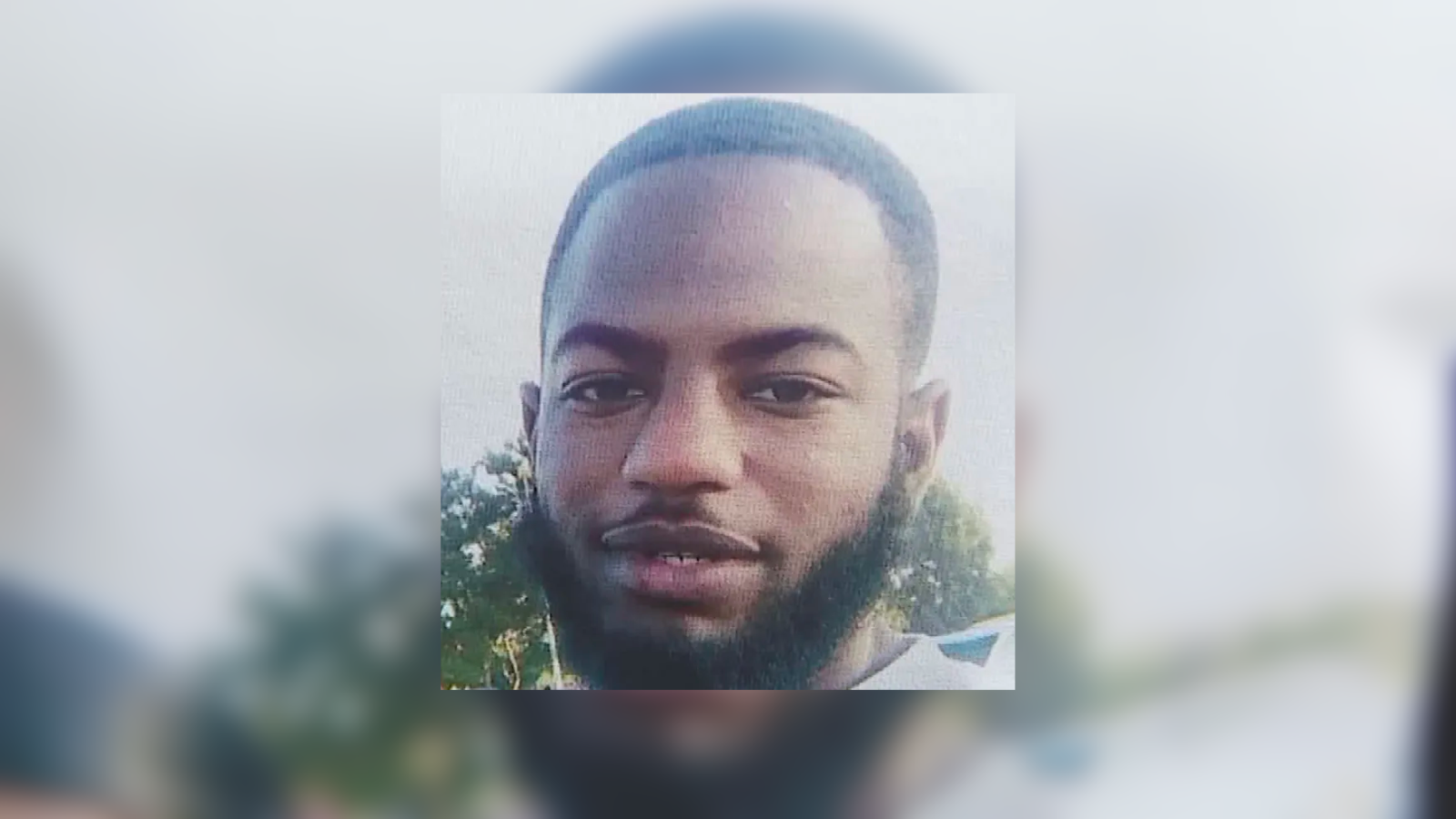 Ryan Twyman, 24, is seen in a photo shown on a T-shirt worn by a person attending a fundraiser for his family in Willowbrook on June 14, 2019. He was fatally shot by sheriff’s deputies in the same neighborhood on June 6, 2019. (Credit: KTLA)