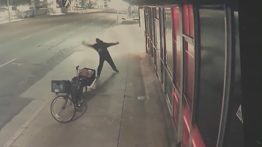 A suspect wanted for smashing glass windows and doors in a series of possible hate crimes targeting stores in the San Fernando Valley in January 2024.