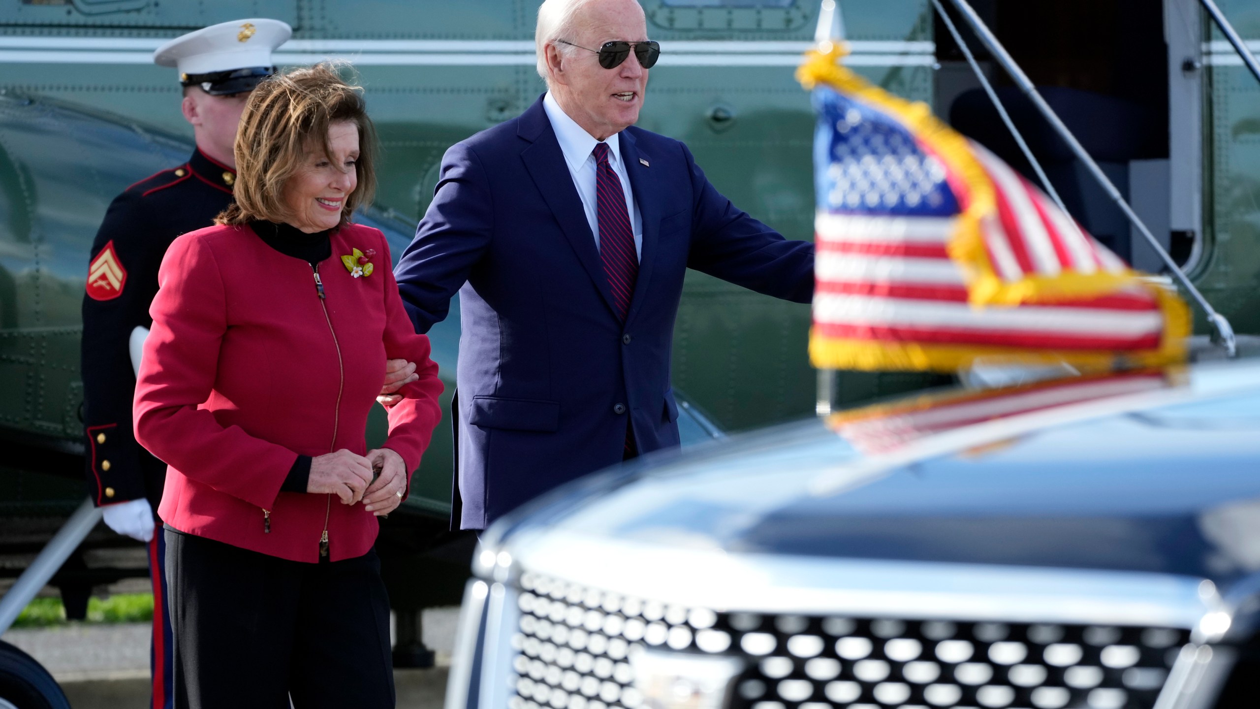 President Joe Biden escorts Rep. Nancy Pelosi, D-Calif., from Marine One to attend a fundraiser in San Francisco, Wednesday, Feb. 21, 2024. (AP Photo/Manuel Balce Ceneta)
