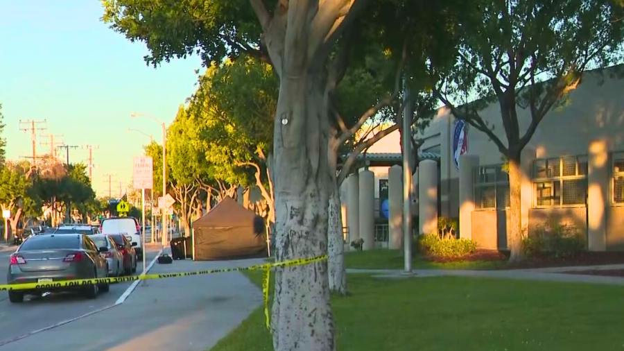 A canopy is seen during a a fatal shooting investigation outside the Ellen Ochoa Learning Center in Cudahy on Feb. 12, 2024.