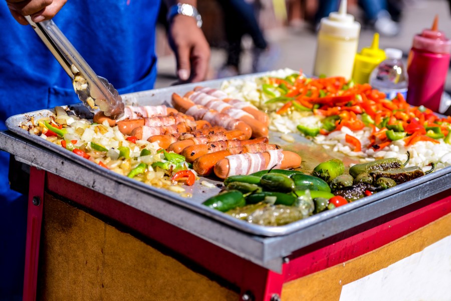 A street vendors sells hot dogs in Los Angeles. (Getty Images)