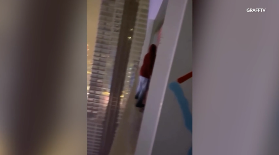 Video shows daredevil tagger on ledge of downtown L.A. skyscraper