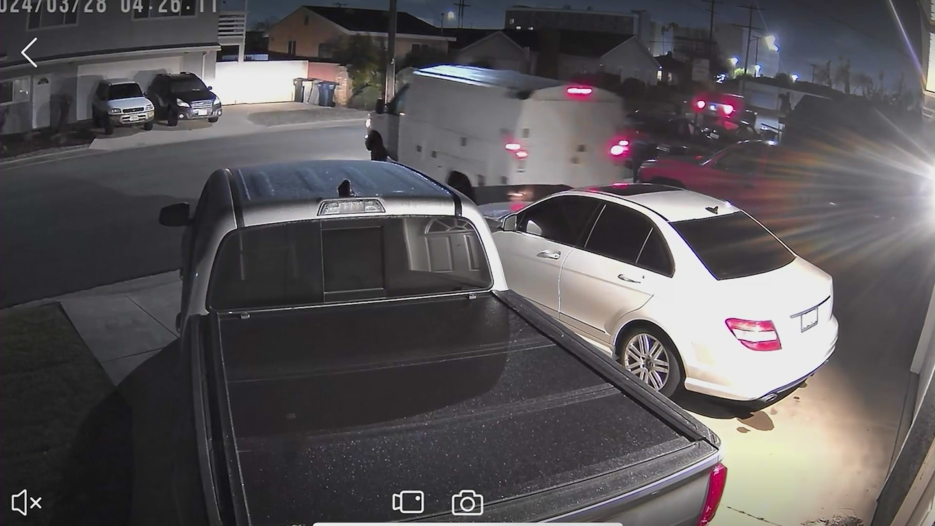 Suspects driving away with a Gardena plumber's work van that was parked on his driveway on March 28, 2024. (Robert Powell)