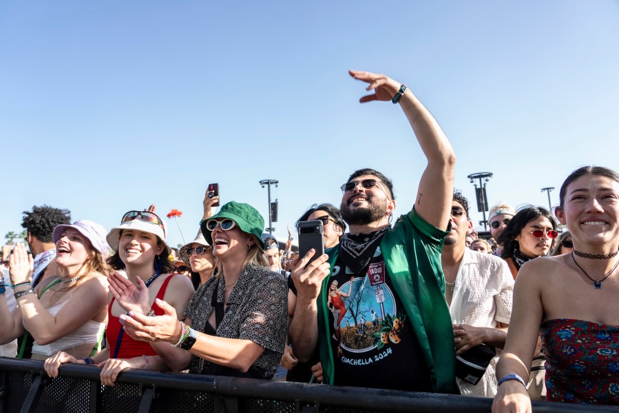Festivalgoers are seen during the the first weekend of the Coachella Valley Music and Arts Festival at the Empire Polo Club on Saturday, April 13, 2024, in Indio, Calif. (Photo by Amy Harris/Invision/AP)