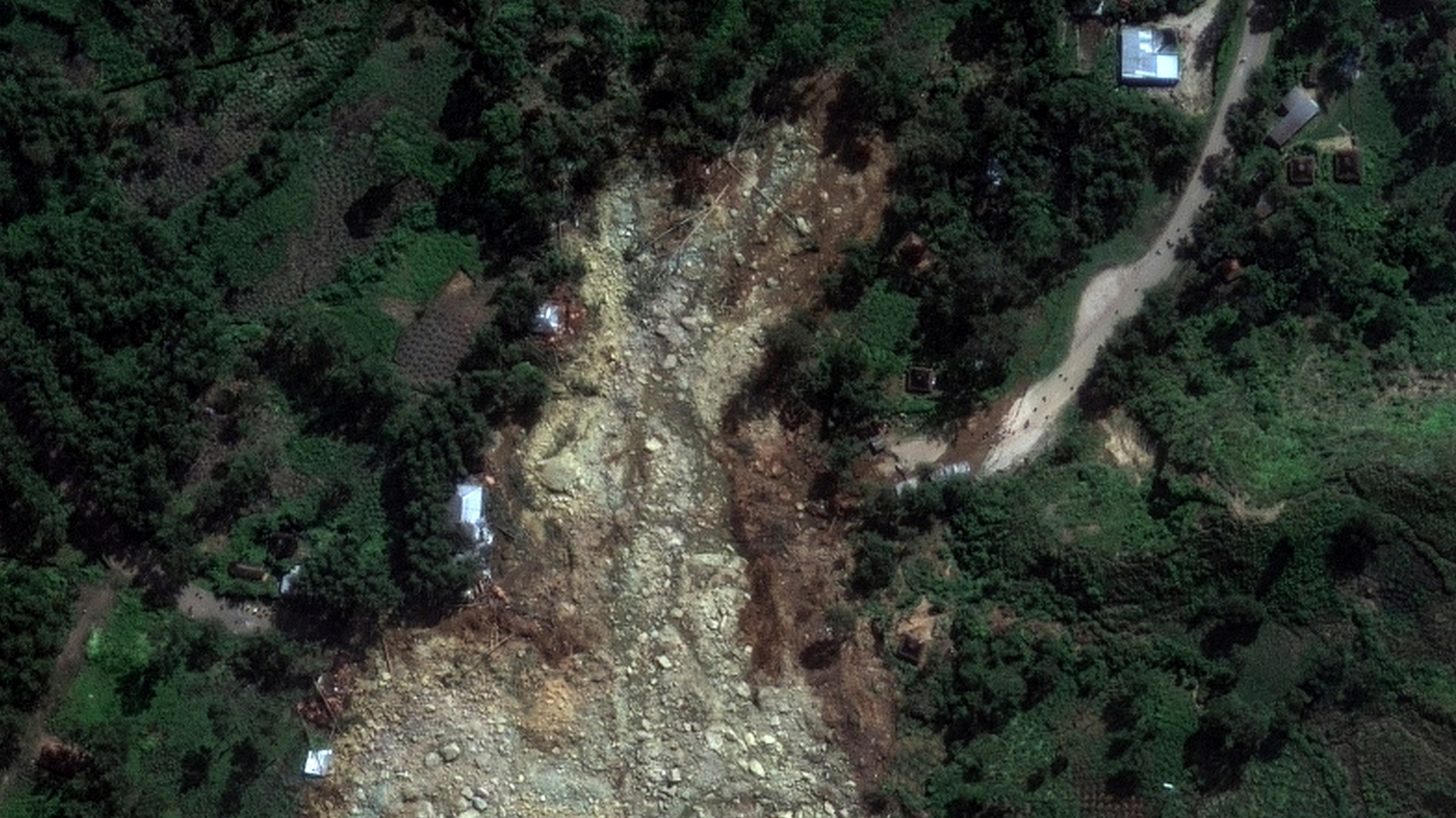 This May 27, 2024, satellite image provided by Maxar Technologies shows the recent landslide in the Enga region of northern Papua New Guinea that killed hundreds of people and buried part of the Yambali village. (Maxar Technologies via AP)