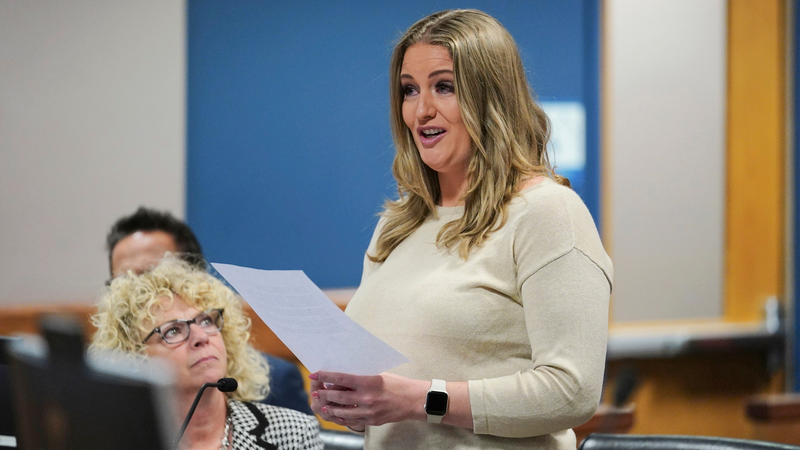 FILE - Jenna Ellis reads a statement inside Fulton Superior Court Judge Scott McAfee's Fulton County Courtroom, Oct. 24, 2023, in Atlanta. Colorado legal officials on Tuesday, May 28, 2024, approved an agreement with Ellis, a onetime attorney for former President Donald Trump, barring her from practicing law in the state for three years after she pleaded guilty to helping Trump try to overturn the 2020 election. (AP Photo/John Bazemore, Pool, File)