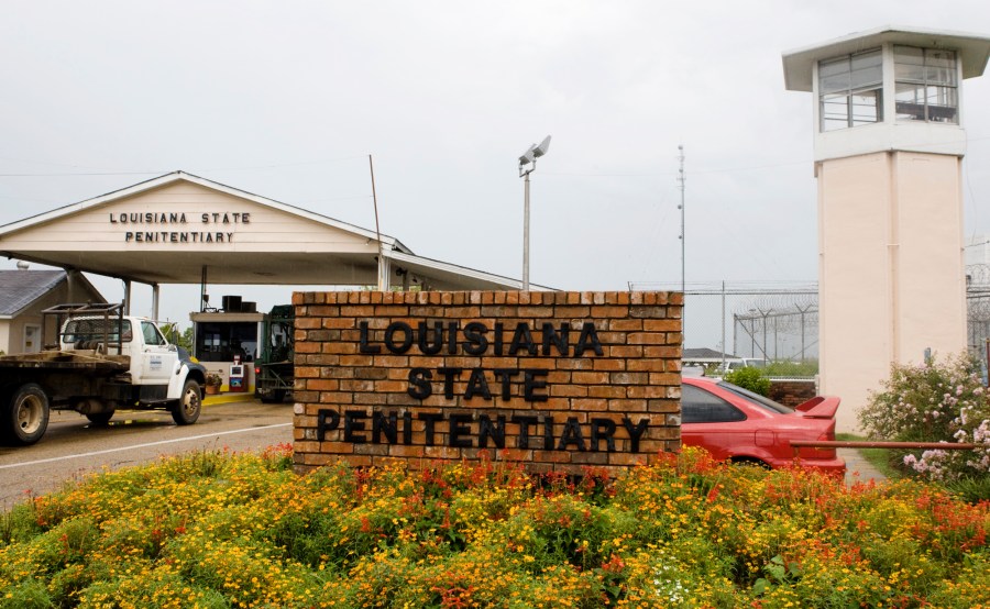 FILE - Vehicles enter at the main security gate at the Louisiana State Penitentiary — the Angola Prison, the largest high-security prison in the country in Angola, La., Aug. 5, 2008. A person found guilty of a sex crime against a child in Louisiana could soon be ordered to undergo surgical castration, in addition to prison time. Louisiana lawmakers gave final approval to a bill Monday, June 3, 2024 that would allow judges the option to sentence someone to surgical castration after the person has been convicted of certain aggravated sex crimes — including rape, incest and molestation — against a child younger than 13. (AP Photo/Judi Bottoni, File)