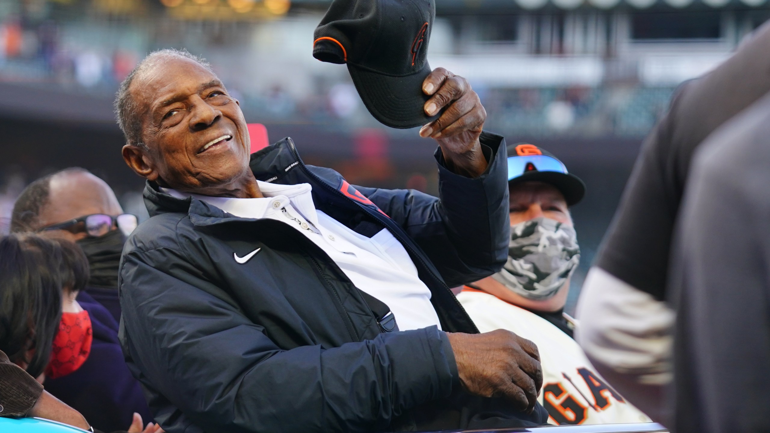 SAN FRANCISCO, CA - MAY 07: Hall of Famer Willie Mays waves to the crowd during the pre-game celebration in honor of his 90th birthday prior to the game between the San Diego Padres and the San Francisco Giants at Oracle Park on Friday, May 7, 2021 in San Francisco, California. (Photo by Daniel Shirey/MLB Photos via Getty Images)