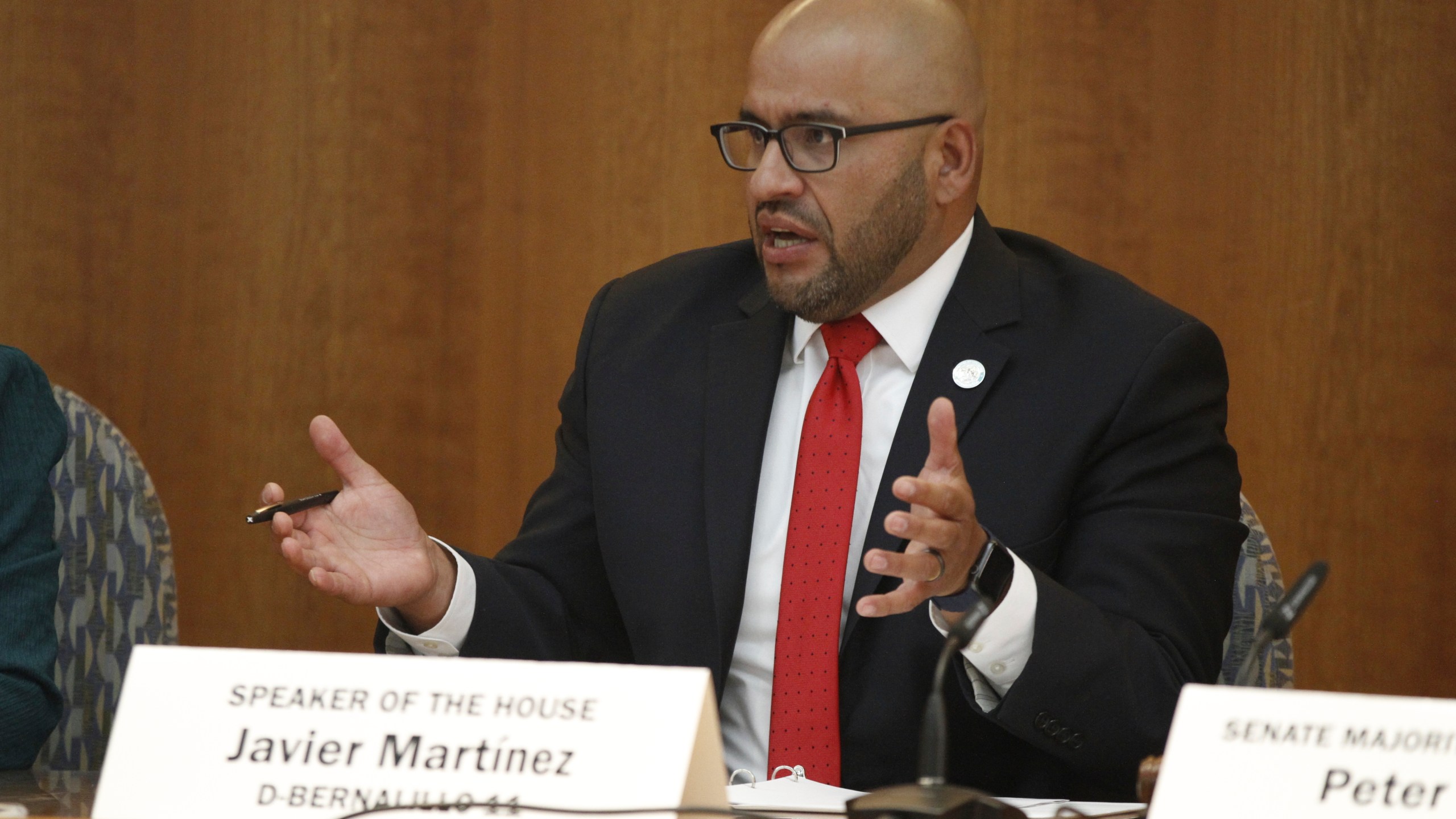New Mexico House Speaker Rep. Javier Martínez of Albuquerque speaks at a news conference, Monday, July 15, 2024, in Santa Fe, N.M., to express concerns about proposals by the governor to address high rates of crime. Gov. Michelle Lujan Grisham is calling for a special legislative session and urging lawmakers to consider longer minimum sentences for gun-toting felons, restrictions on panhandling and an expansion of involuntary detention and treatment for mental health problems and addiction. (AP Photo/Morgan Lee)