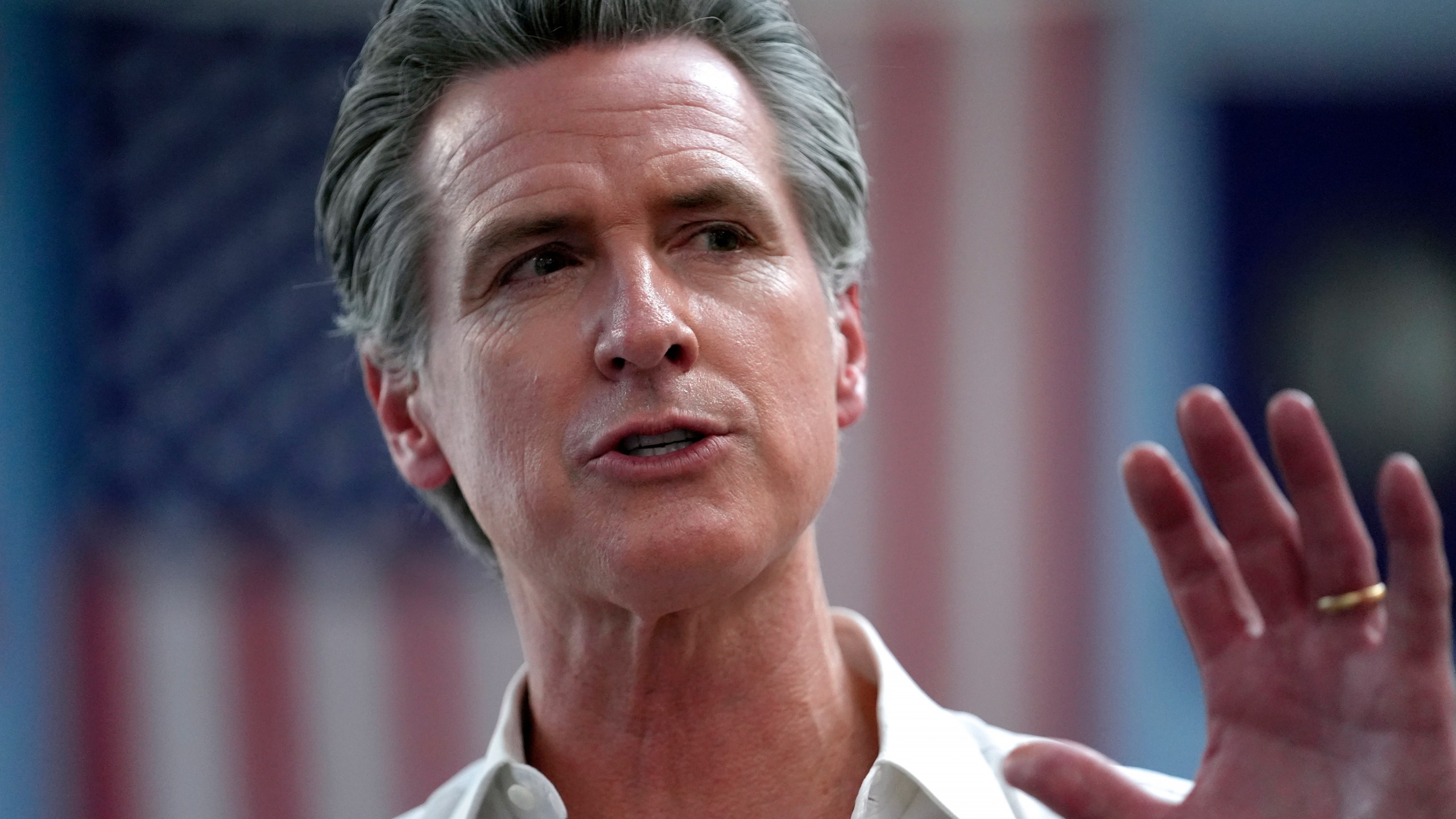 FILE - California Gov. Gavin Newsom greets people, July 8, 2024, near the Common Man Roadside Market and Deli, in Hooksett, N.H. (AP Photo/Steven Senne, File)