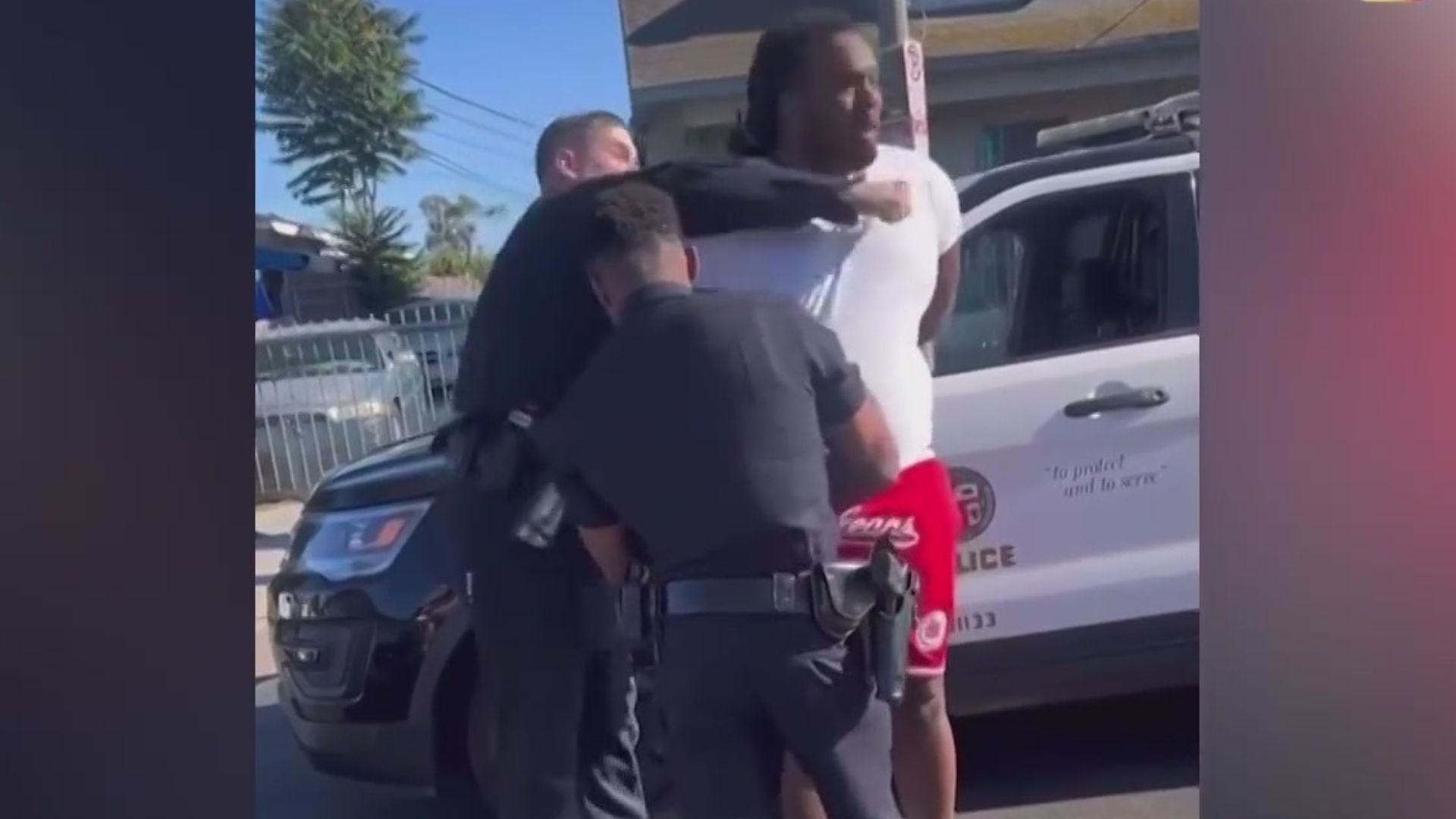 LA cop punches man in face
