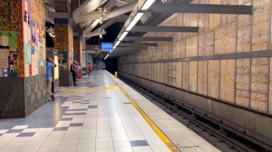 Riders wait for a subway ride at the Universal City/Studio City Metro Station. (KTLA)
