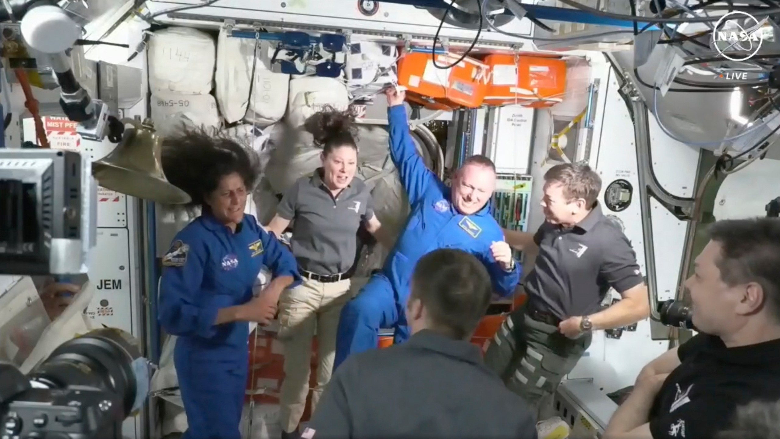 FILE - NASA astronauts Butch Wilmore and Suni Williams are greeted by the crew of the International Space Station on Thursday, June 6, 2024. (NASA via AP, File)