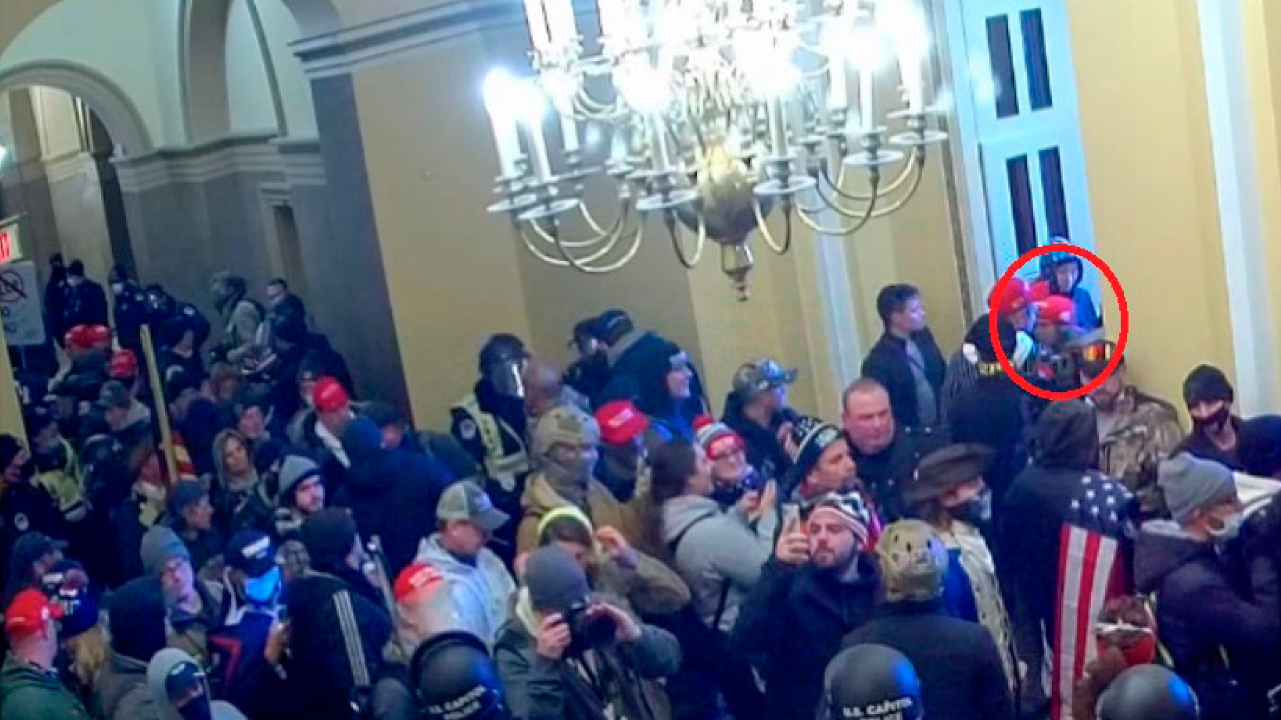 This image from video from the Justice Department in the statement of facts supporting an arrest warrant, and annotated by the source, shows Kennedy Lindsey entering the U.S. Capitol on Jan. 6, 2021, in Washington. (Justice Department via AP)