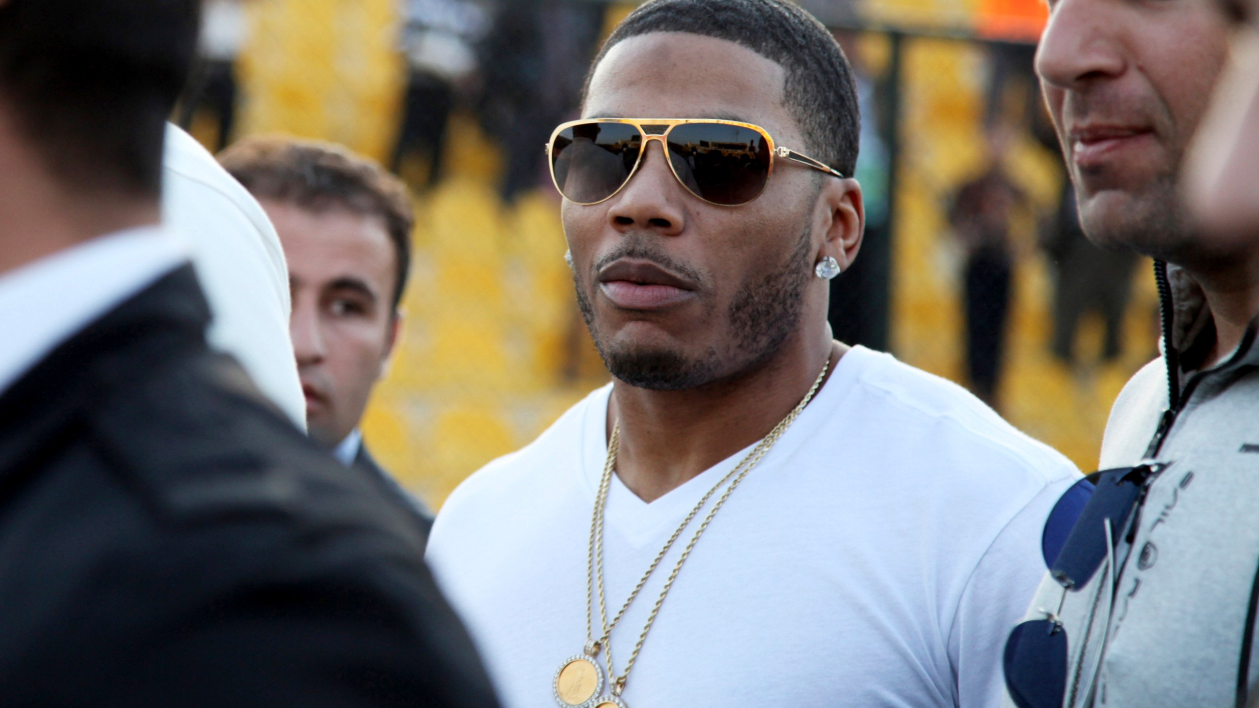 FILE - Rapper Nelly approaches the stage for a concert in Erbil, northern Iraq, March 13, 2015. (AP Photo/Seivan M. Salim, File)