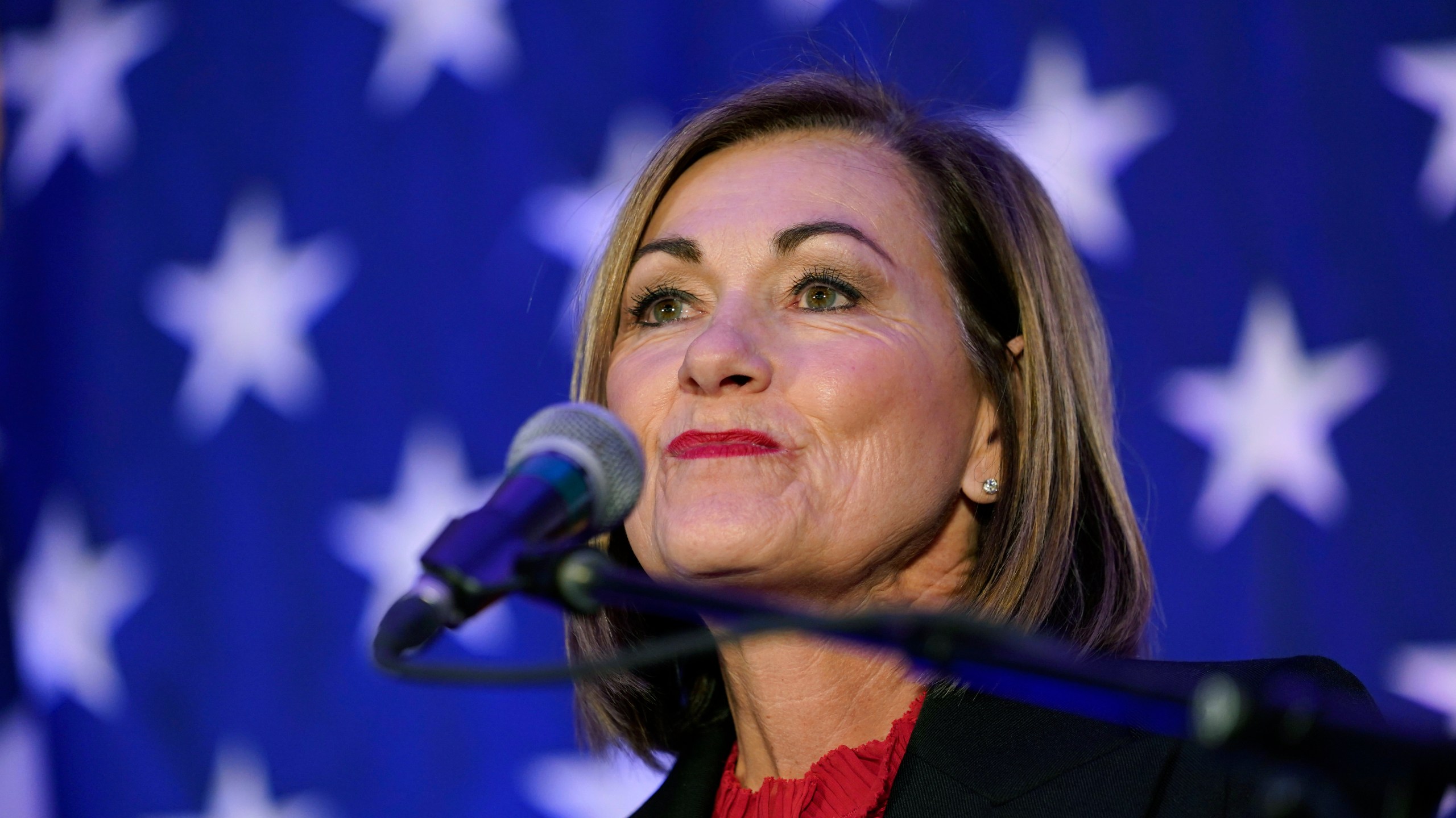 FILE - Iowa Gov. Kim Reynolds speaks to supporters during a Republican Party of Iowa election night rally, Nov. 8, 2022, in Des Moines, Iowa. (AP Photo/Charlie Neibergall, File)
